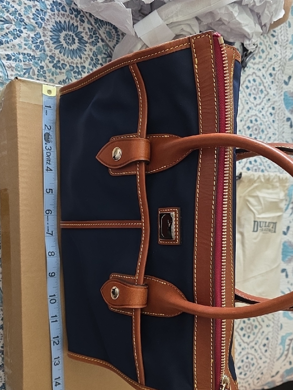 Dooney & Bourke Navy Bag With Gold Accents.